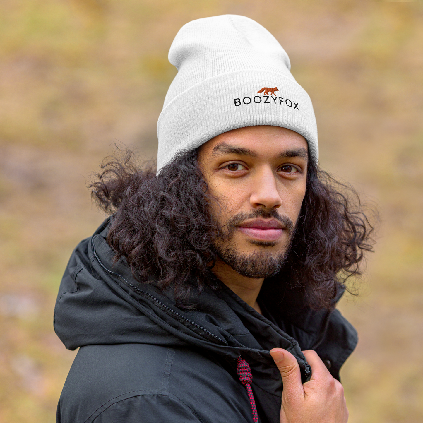 Man wearing a White Cuffed Beanie With An Embroidered Boozy Fox Logo On Fold - Shop Cuffed Beanie Online - Boozy Fox