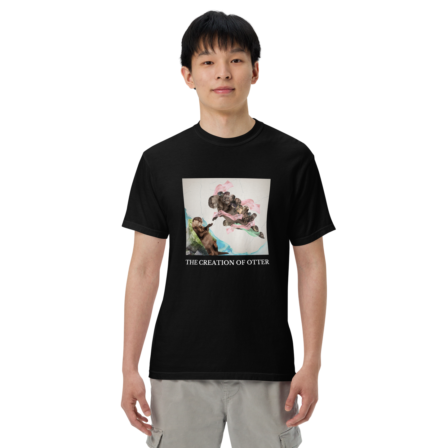 Man wearing a black The Creation of Otter Heavyweight T-Shirt - Boozy Fox