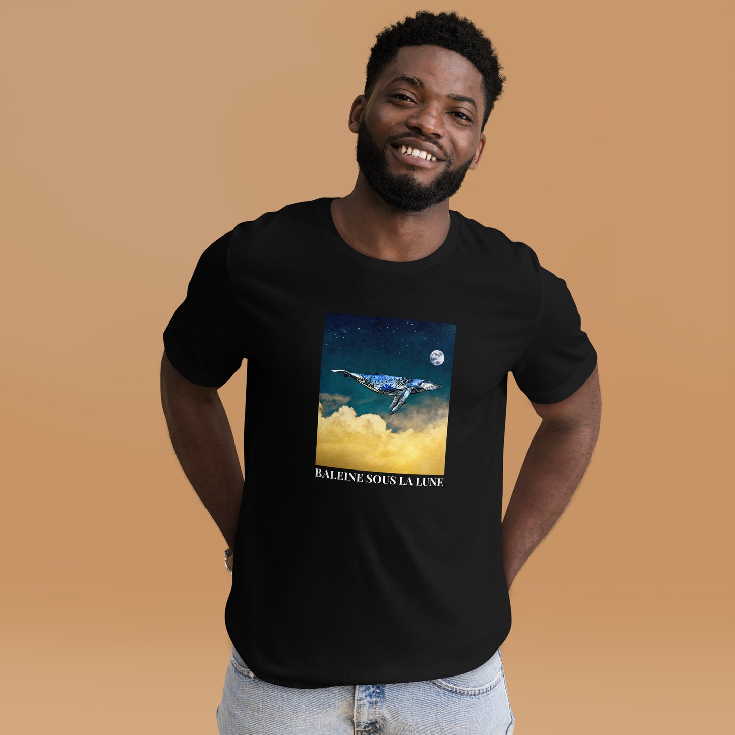 Smiling Man wearing a Black Premium Whale T-Shirt featuring a majestic Whale Under The Moon graphic on the chest - Cool Graphic Whale Tees - Boozy Fox