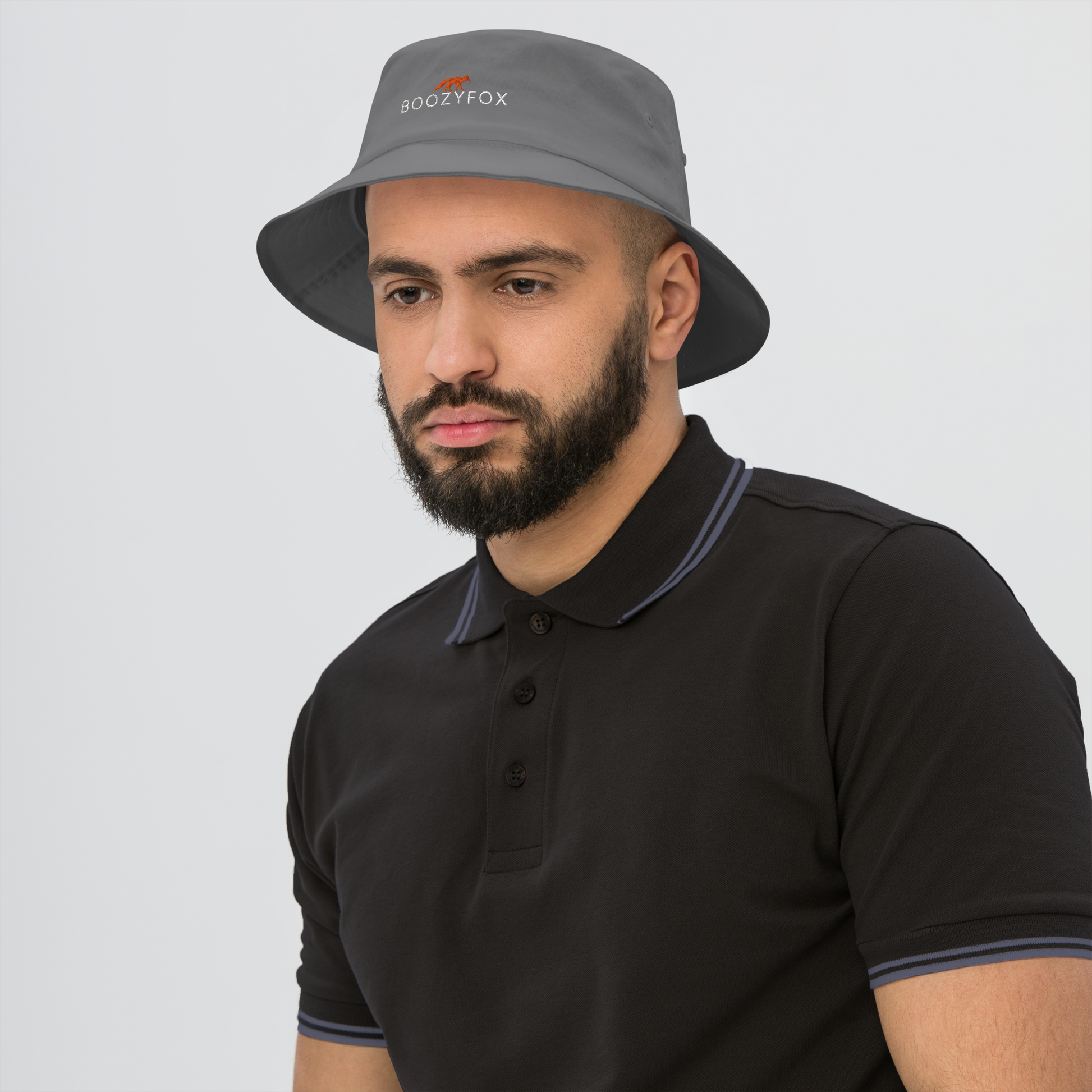 Man wearing a Cool Grey Bucket Hat featuring a striking embroidered Boozy Fox logo on front. Shop Cool Sun Protection Bucket Hats And Wide Brim Hats Online - Boozy Fox