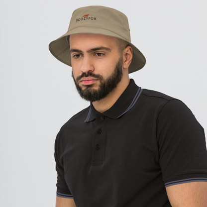 Man wearing a Cool Khaki Bucket Hat featuring a striking embroidered Boozy Fox logo on front. Shop Cool Sun Protection Bucket Hats And Wide Brim Hats Online - Boozy Fox