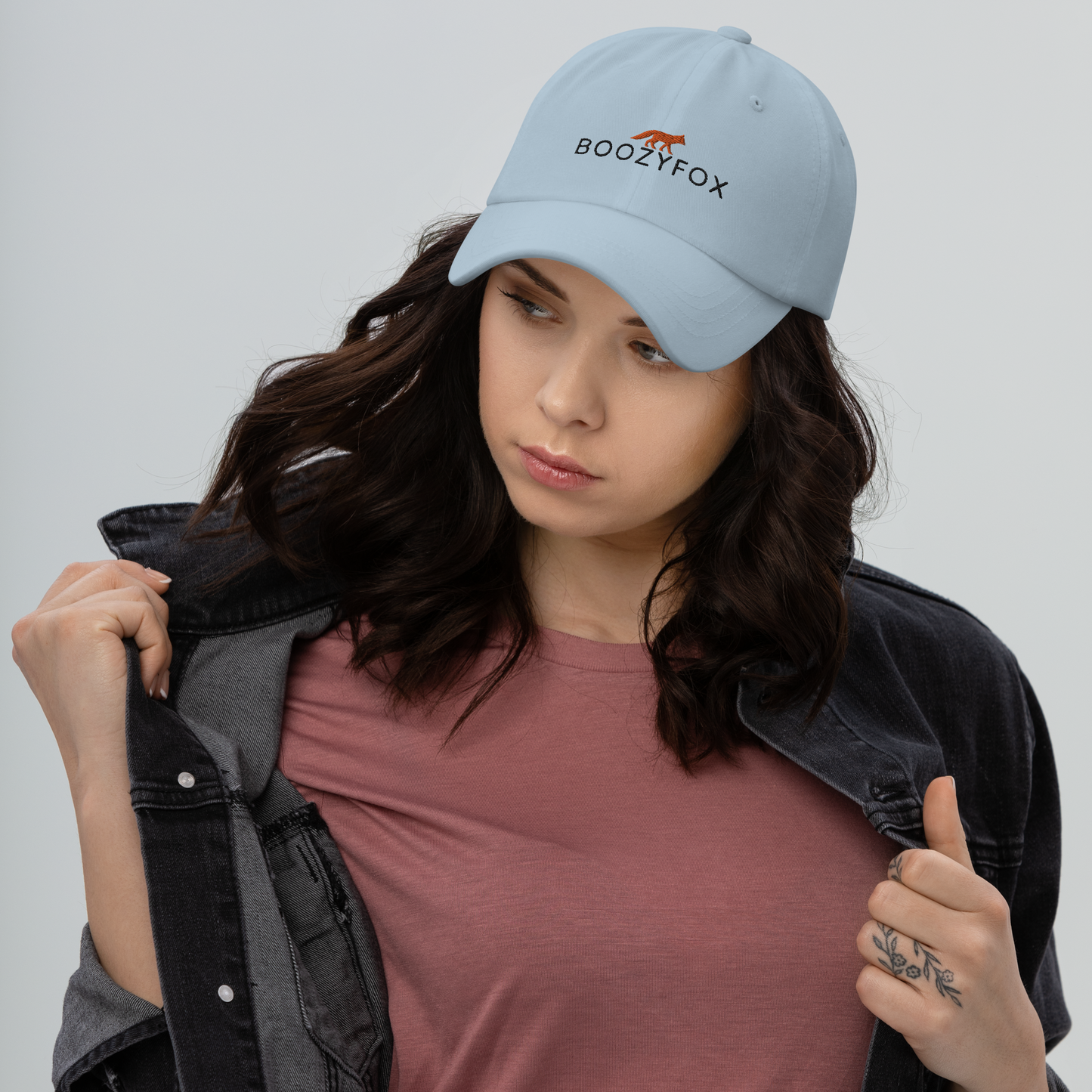 Woman wearing a Light Blue Dad Hat - Boozy Fox