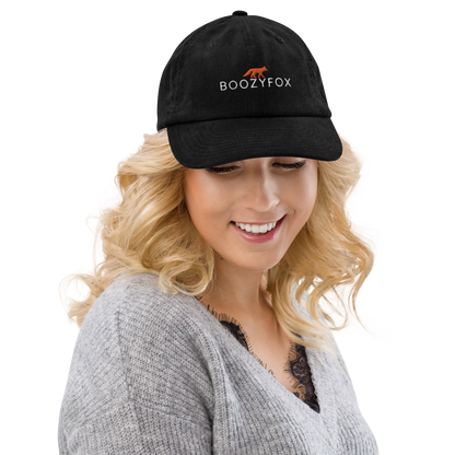 Smiling woman wearing a Black Corduroy Hat featuring an embroidered Boozy Fox logo on front. Shop Cool Corduroy Hats & Corduroy Caps Online - Boozy Fox
