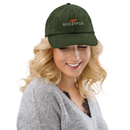 Smiling woman wearing a Dark Olive Green Corduroy Hat - Boozy Fox