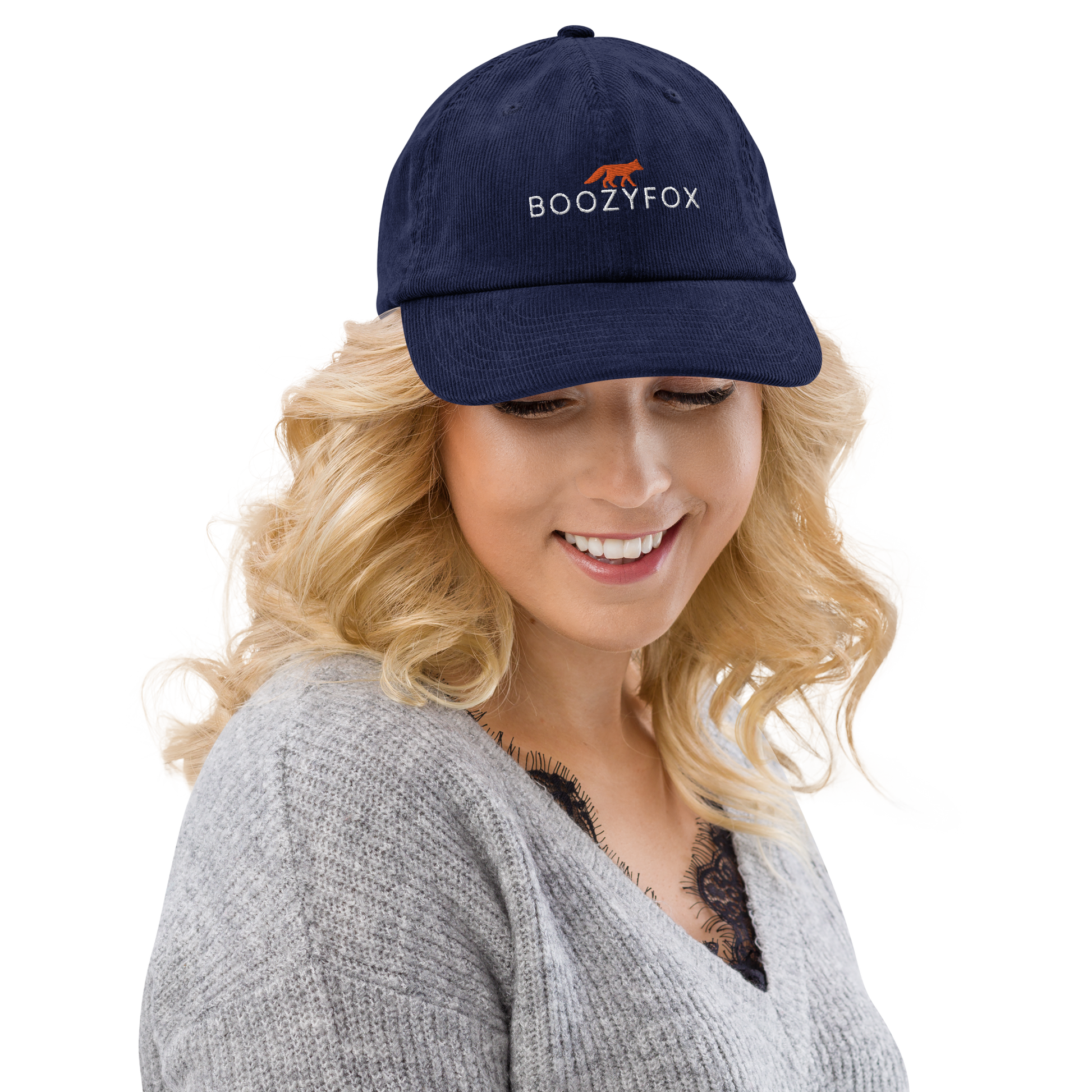 Smiling woman wearing a Oxford Navy Corduroy Hat featuring an embroidered Boozy Fox logo on front. Shop Cool Corduroy Hats & Corduroy Caps Online - Boozy Fox