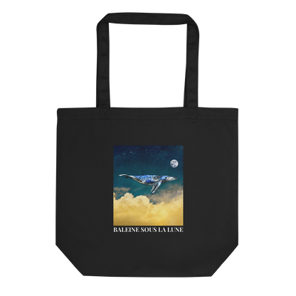 Black Whale Eco Tote Bag featuring a majestic Whale Under The Moon graphic - Shop Cool Organic Cotton Tote Bags Online - Boozy Fox