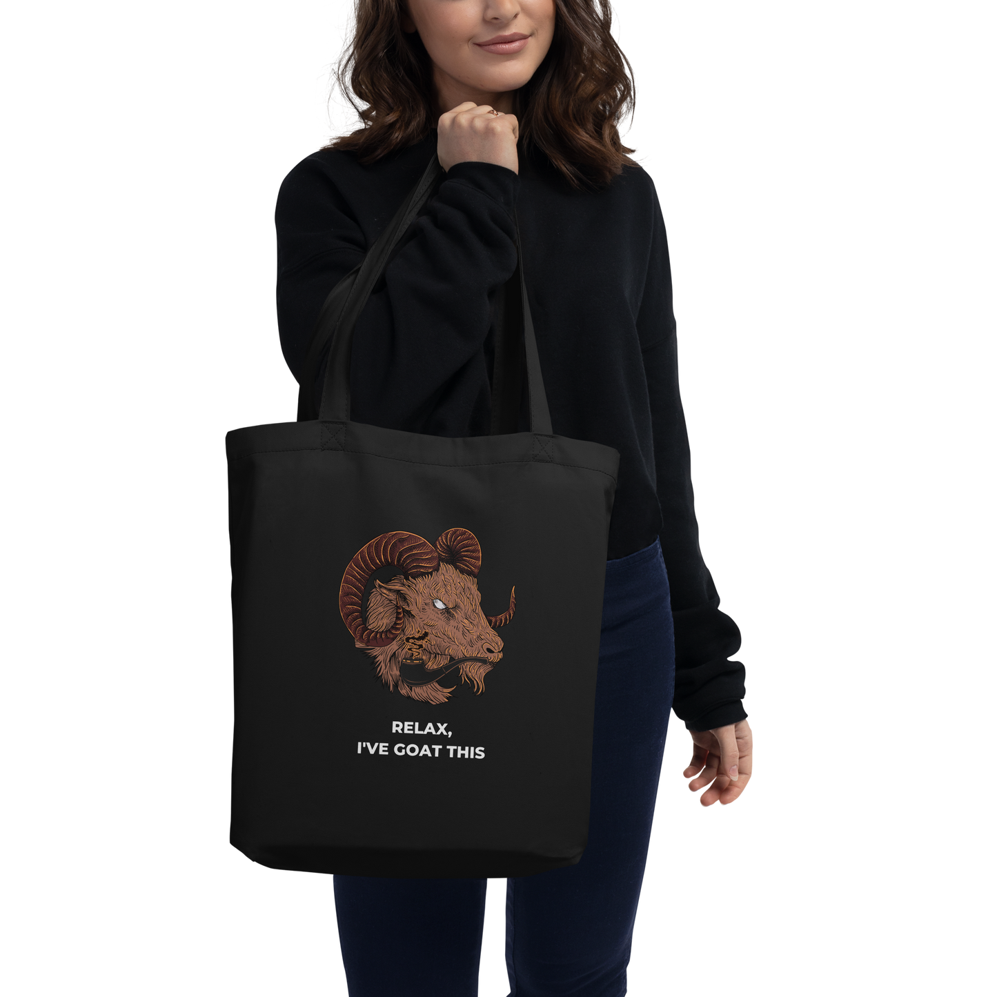 Woman carrying a Black Goat Eco Tote Bag featuring a fierce Relax I've Goat This graphic - Shop Tote Bags Online - Boozy Fox