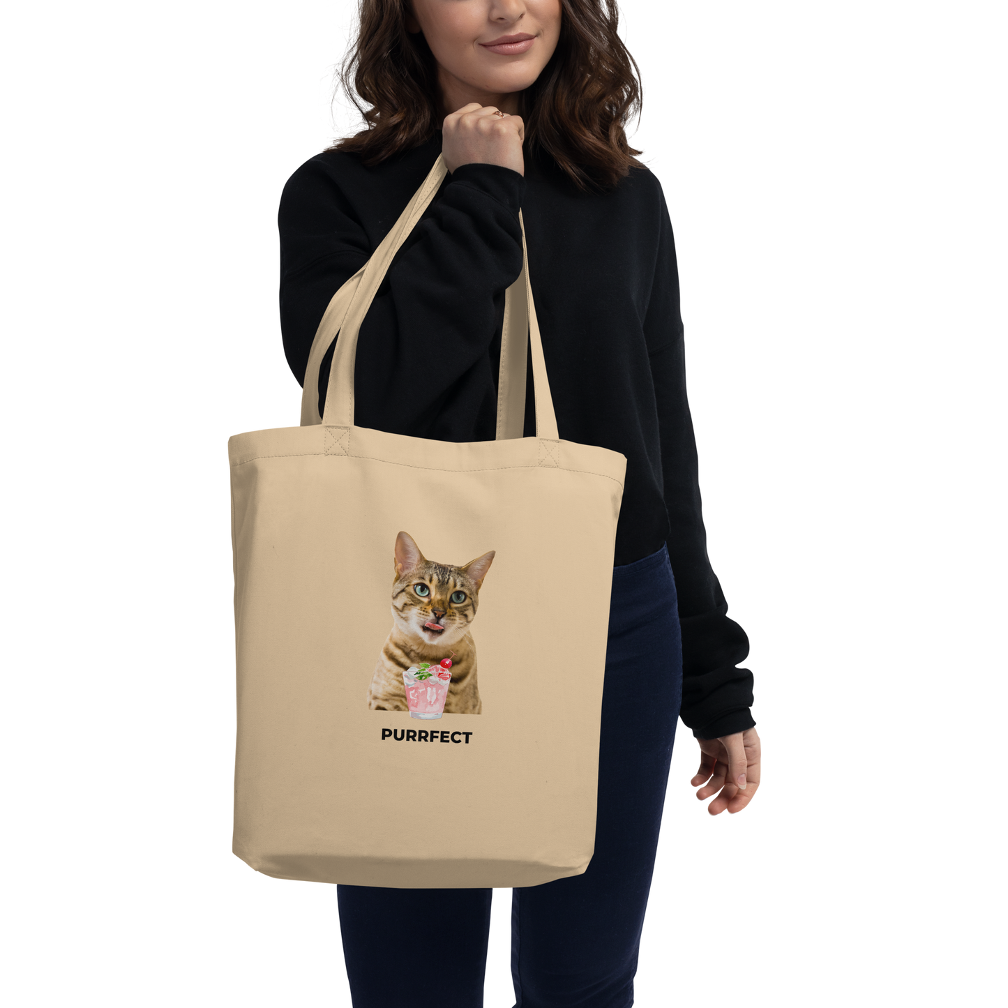 Woman Carrying Oyster Colored Cat Eco Tote Bag with an exclusive Purrfect graphic - Boozy Fox