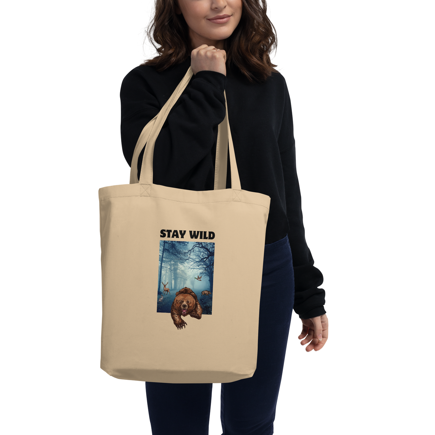 Woman carrying a Oyster Colored Bear Eco Tote Bag featuring a Stay Wild graphic - Cool Organic Cotton Totes - Boozy Fox