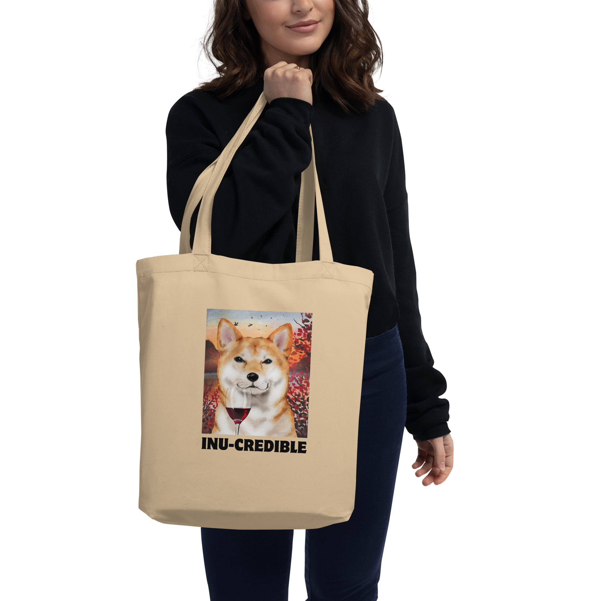 Woman carrying a oyster colored Shiba Inu Eco Tote Bag featuring a Inu-Credible Shiba Inu graphic - Shop Funny Organic Cotton Tote Bags Online - Boozy Fox