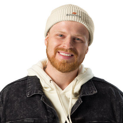 Man wearing a Ecru Beige Fisherman Beanie With An Embroidered Boozy Fox Logo On Fold - Cool Winter Beanies - Boozy Fox