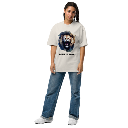 Woman wearing a Funny Born to Roar Lion oversized graphic t-shirt in faded bone white by Boozy Fox