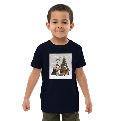 Young boy wearing a French Navy Christmas Animals Organic Cotton Kids T-Shirt featuring a delightful Christmas Tree Surrounded by Adorable Animals graphic on the chest - Kids' Graphic Tees - Funny Christmas Tee Shirts - Boozy Fox