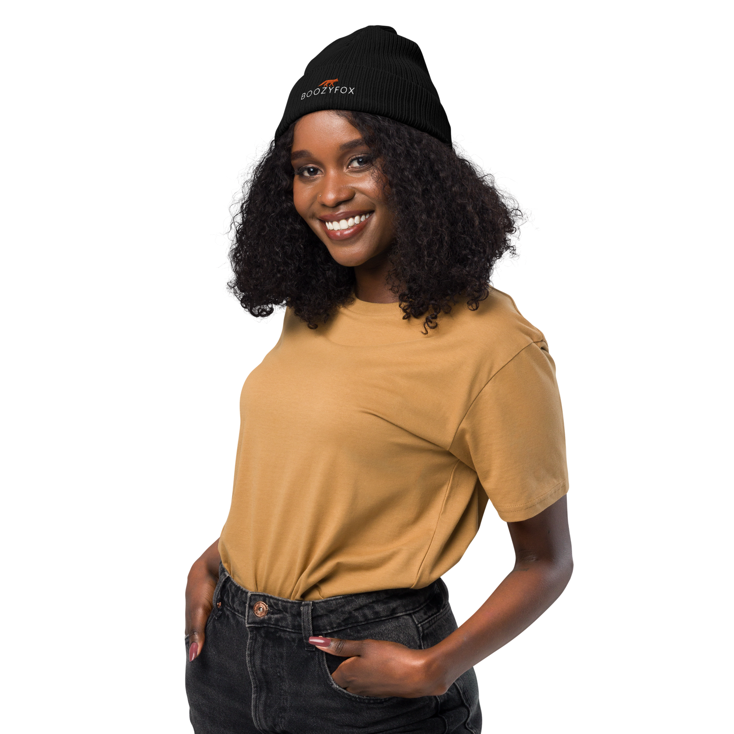 Smiling woman wearing a Black Organic Ribbed Beanie With An Embroidered Boozy Fox Logo On Fold - Shop Organic Cotton Beanies Online - Boozy Fox