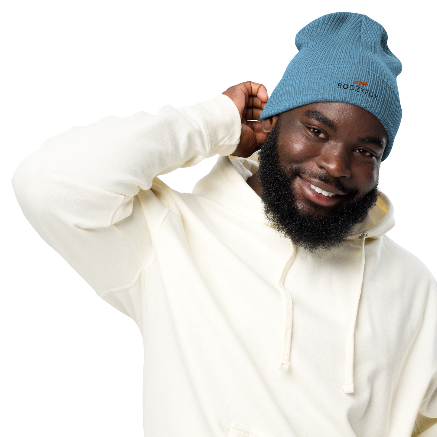 Smiling man wearing a Light Avio Blue Organic Ribbed Beanie With An Embroidered Boozy Fox Logo On Fold - Shop Organic Cotton Beanies Online - Boozy Fox
