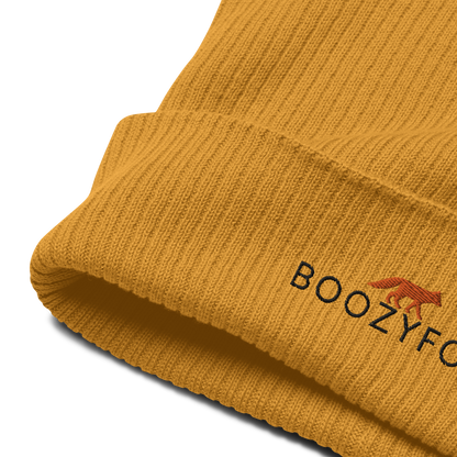 Front details of a Mustard Yellow Organic Ribbed Beanie With An Embroidered Boozy Fox Logo On Fold - Shop Organic Cotton Beanies Online - Boozy Fox