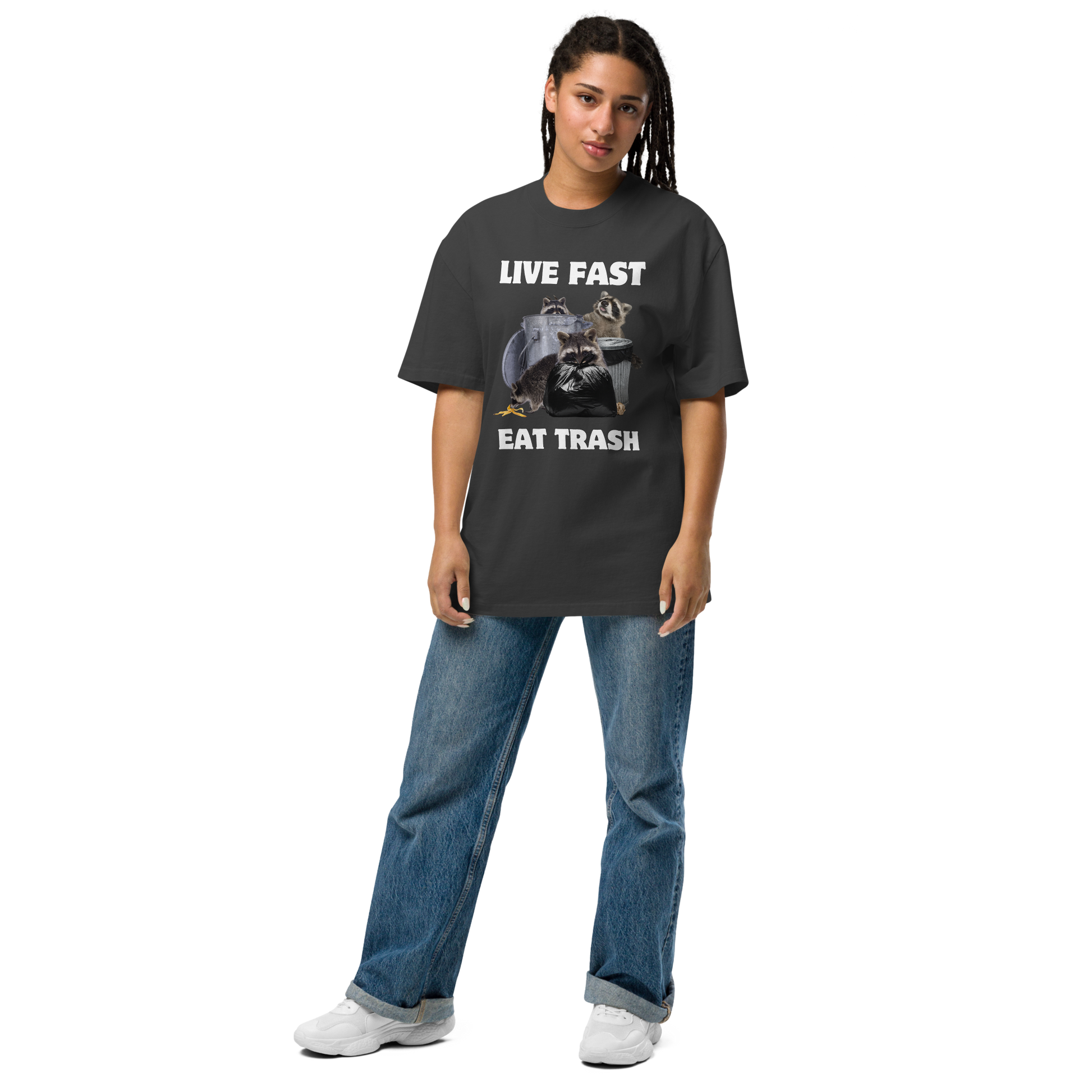 Woman wearing a Faded Black Raccoon Oversized T-Shirt featuring the bold Live Fast Eat Trash graphic on the chest - Funny Graphic Raccoon Oversized Tees - Boozy Fox