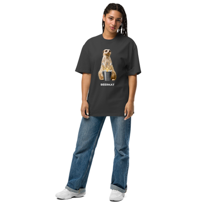 Woman wearing a Faded Black Meerkat Oversized T-Shirt featuring a hilarious Beerkat graphic on the chest - Funny Graphic Meerkat Oversized Tees - Boozy Fox