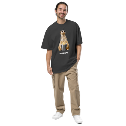 Smiling man wearing a Faded Black Meerkat Oversized T-Shirt featuring a hilarious Beerkat graphic on the chest - Funny Graphic Meerkat Oversized Tees - Boozy Fox