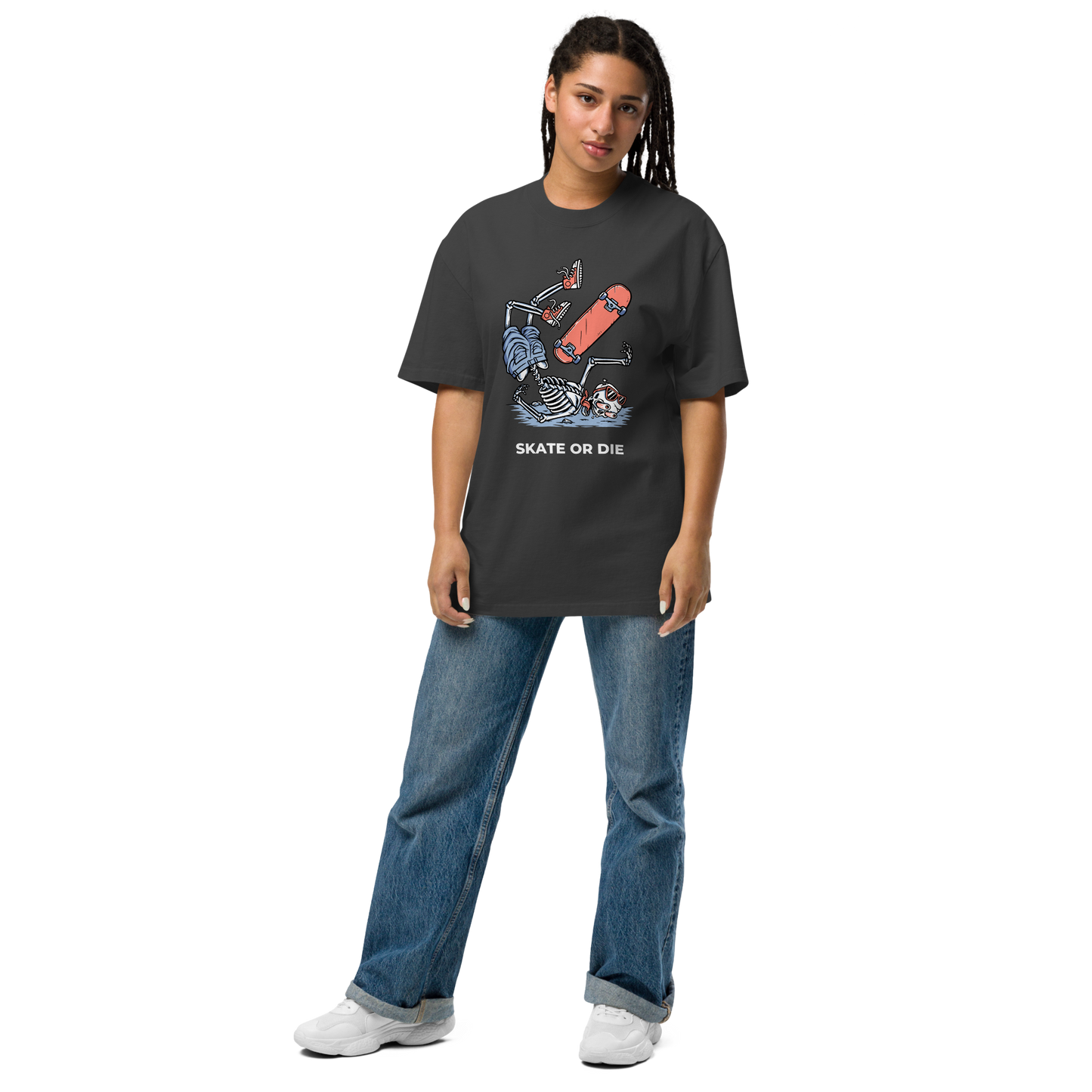 Woman wearing a Faded Black Skate or Die Oversized T-Shirt featuring a fearless Skeleton Falling While Skateboarding graphic on the chest - Cool Graphic Skeleton Oversized Tees - Boozy Fox