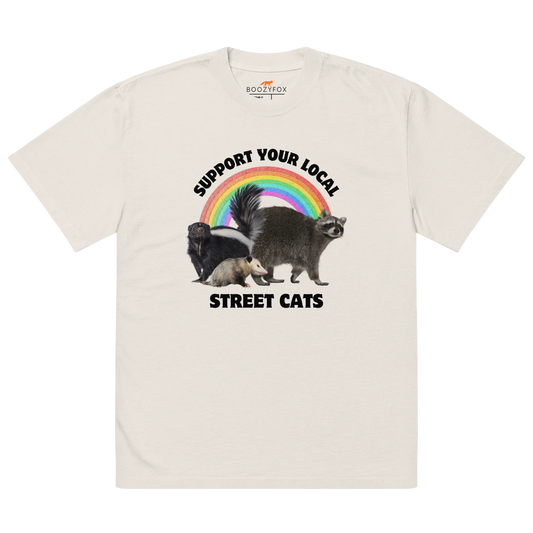 Faded Bone Street Cats Oversized T-Shirt featuring a purr-fect trio – opossum, skunk, raccoon – and the Support Your Local Street Cats graphic on the chest - Funny Graphic Animal Oversized Tees - Boozy Fox