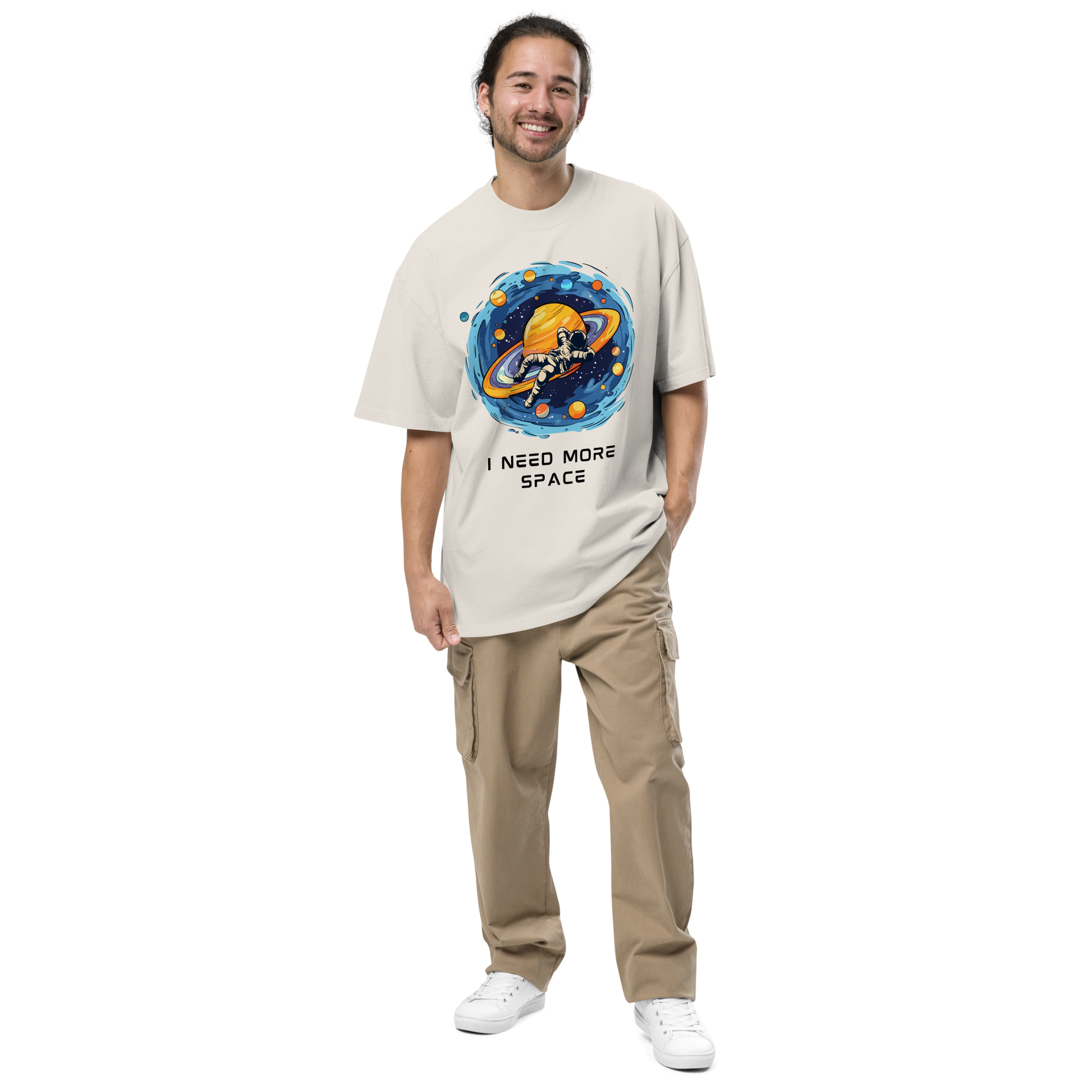 Smiling man wearing a Faded Bone Space Oversized T-Shirt featuring a captivating I Need More Space graphic on the chest - Funny Graphic Space Oversized Tees - Boozy Fox