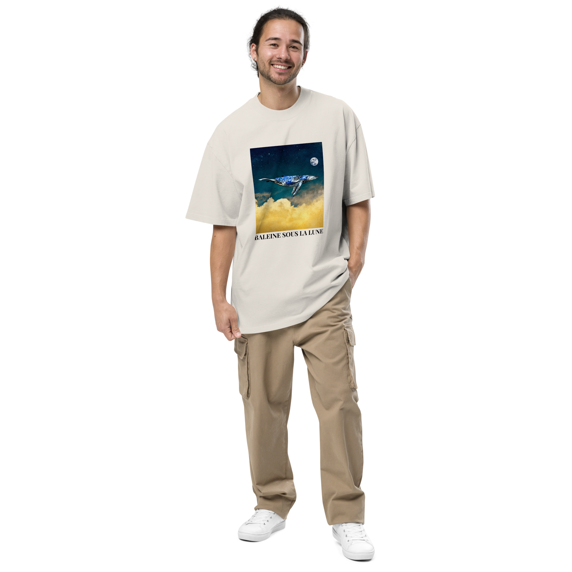 Smiling man wearing a Faded Bone Whale Under The Moon Oversized Tee - Boozy Fox