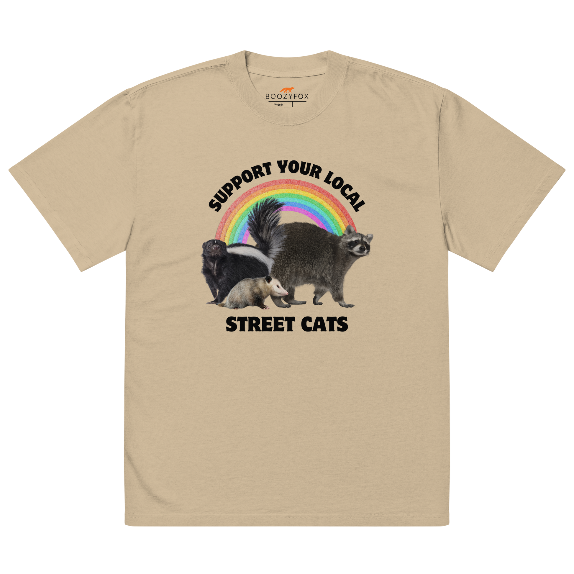 Faded Khaki Street Cats Oversized T-Shirt featuring a purr-fect trio – opossum, skunk, raccoon – and the Support Your Local Street Cats graphic on the chest - Funny Graphic Animal Oversized Tees - Boozy Fox