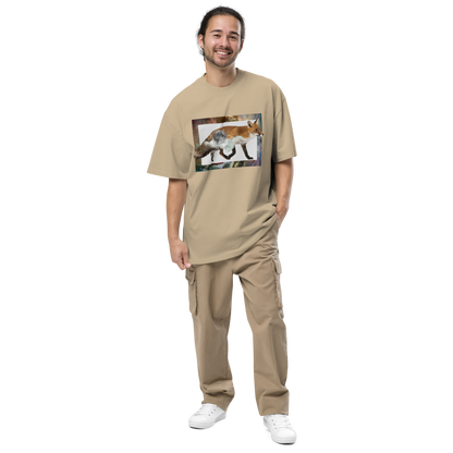 Smiling man wearing a Faded Khaki Fox Oversized T-Shirt featuring a stellar Space Fox graphic on the chest - Cool Graphic Fox Oversized Tees - Boozy Fox