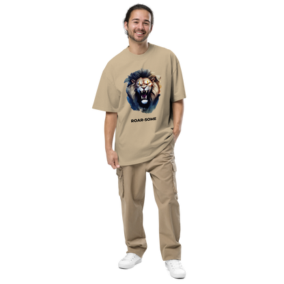 Smiling man wearing a Faded Khaki Lion Oversized T-Shirt featuring a Roar-Some graphic on the chest - Cool Graphic Lion Oversized Tees - Boozy Fox