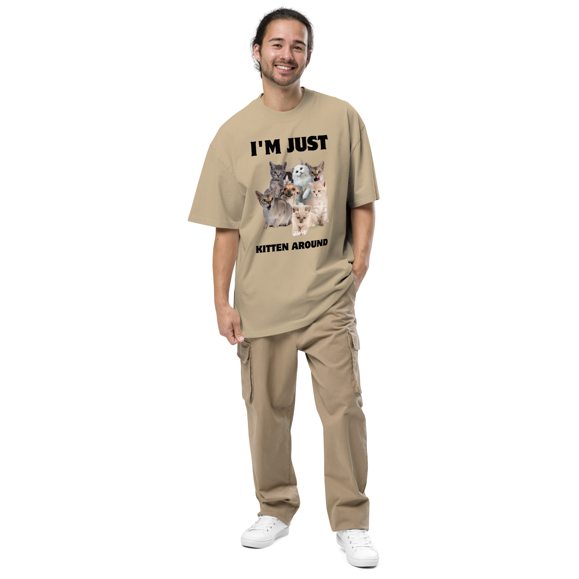 Man wearing a Faded Khaki Cat Oversized T-Shirt featuring an I'm Just Kitten Around graphic on the chest - Funny Graphic Cat Oversized Tees - Boozy Fox