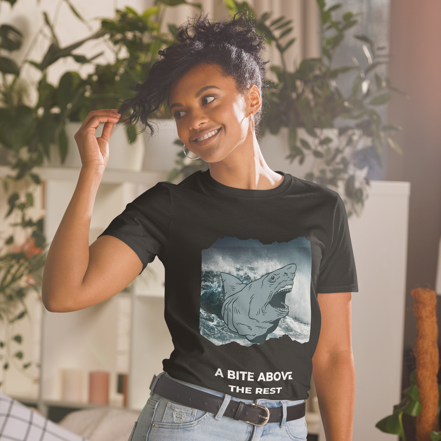 Smiling woman wearing a Black Megalodon T-Shirt featuring A Bite Above the Rest graphic on the chest - Funny Graphic Megalodon T-Shirts - Boozy Fox