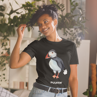 Smiling woman wearing a Black Puffin T-Shirt featuring a comic Puuffin' graphic on the chest - Funny Graphic Puffin T-Shirts - Boozy Fox