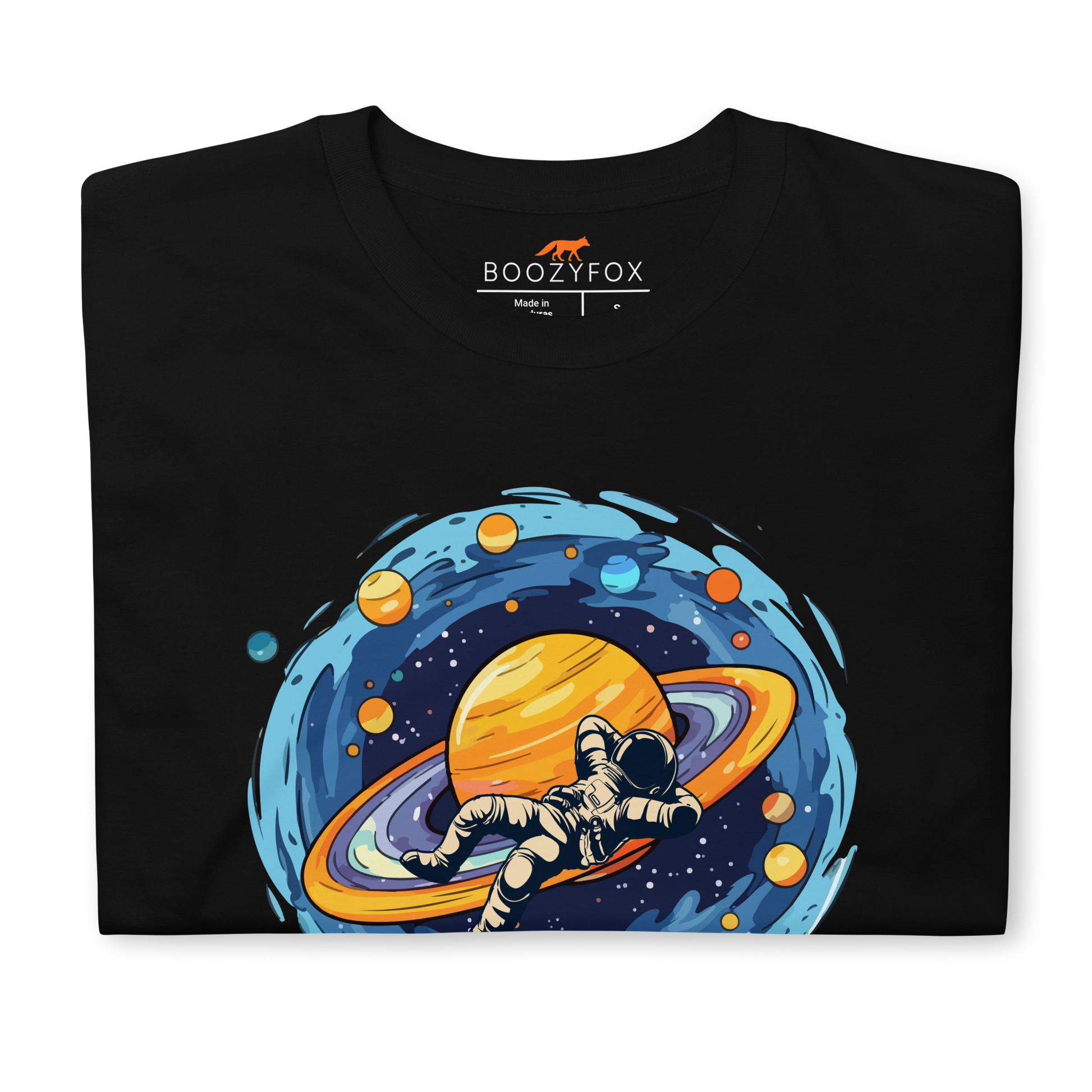 Front details of a Black Astronaut T-Shirt featuring a captivating I Need More Space graphic on the chest - Funny Graphic Space T-Shirts - Boozy Fox