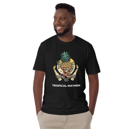 Smiling man wearing a Black Tropical Mayhem T-Shirt featuring a Crazy Pineapple Skull graphic on the chest - Funny Graphic Pineapple T-Shirts - Boozy Fox