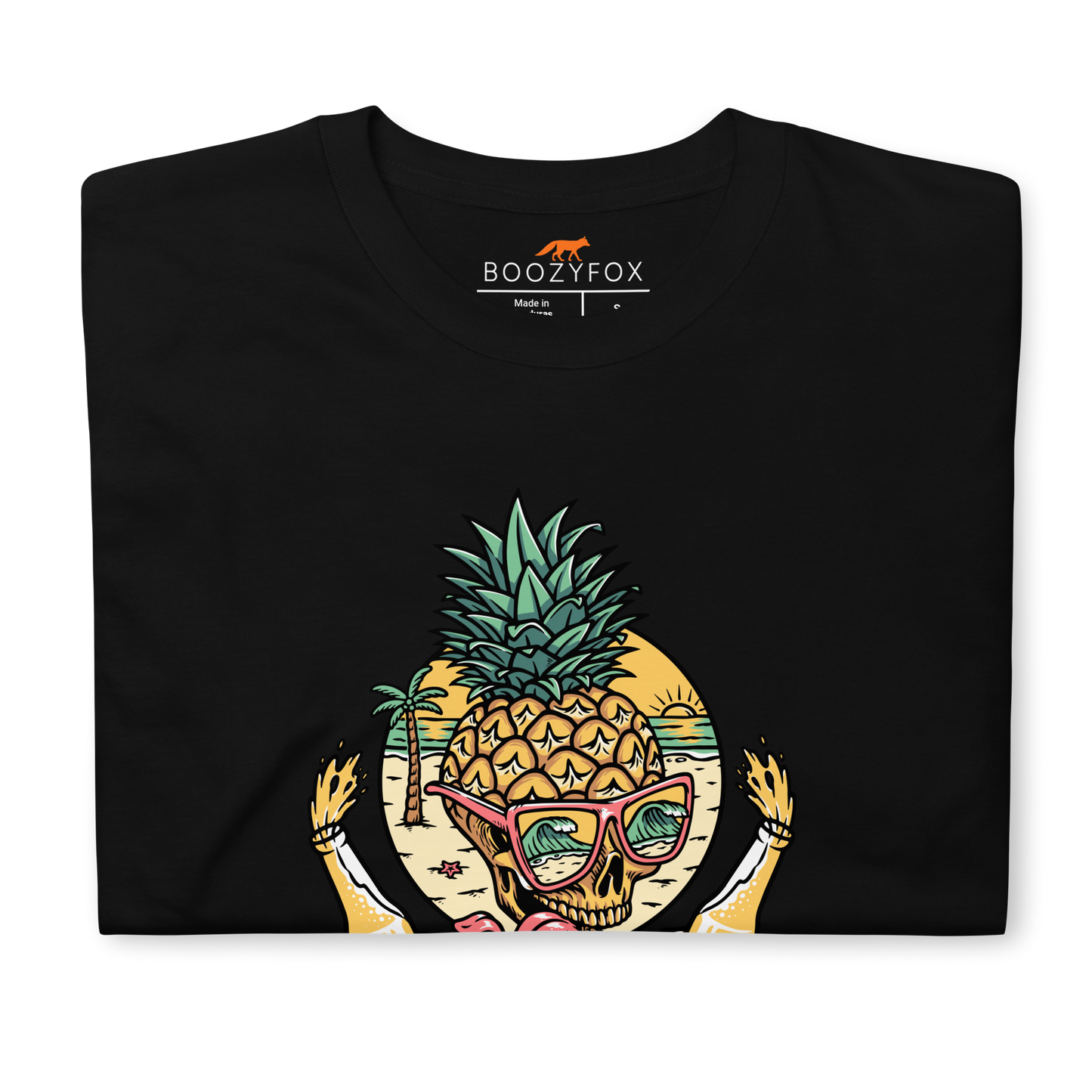 Front details of a Black Tropical Mayhem T-Shirt featuring a Crazy Pineapple Skull graphic on the chest - Funny Graphic Pineapple T-Shirts - Boozy Fox