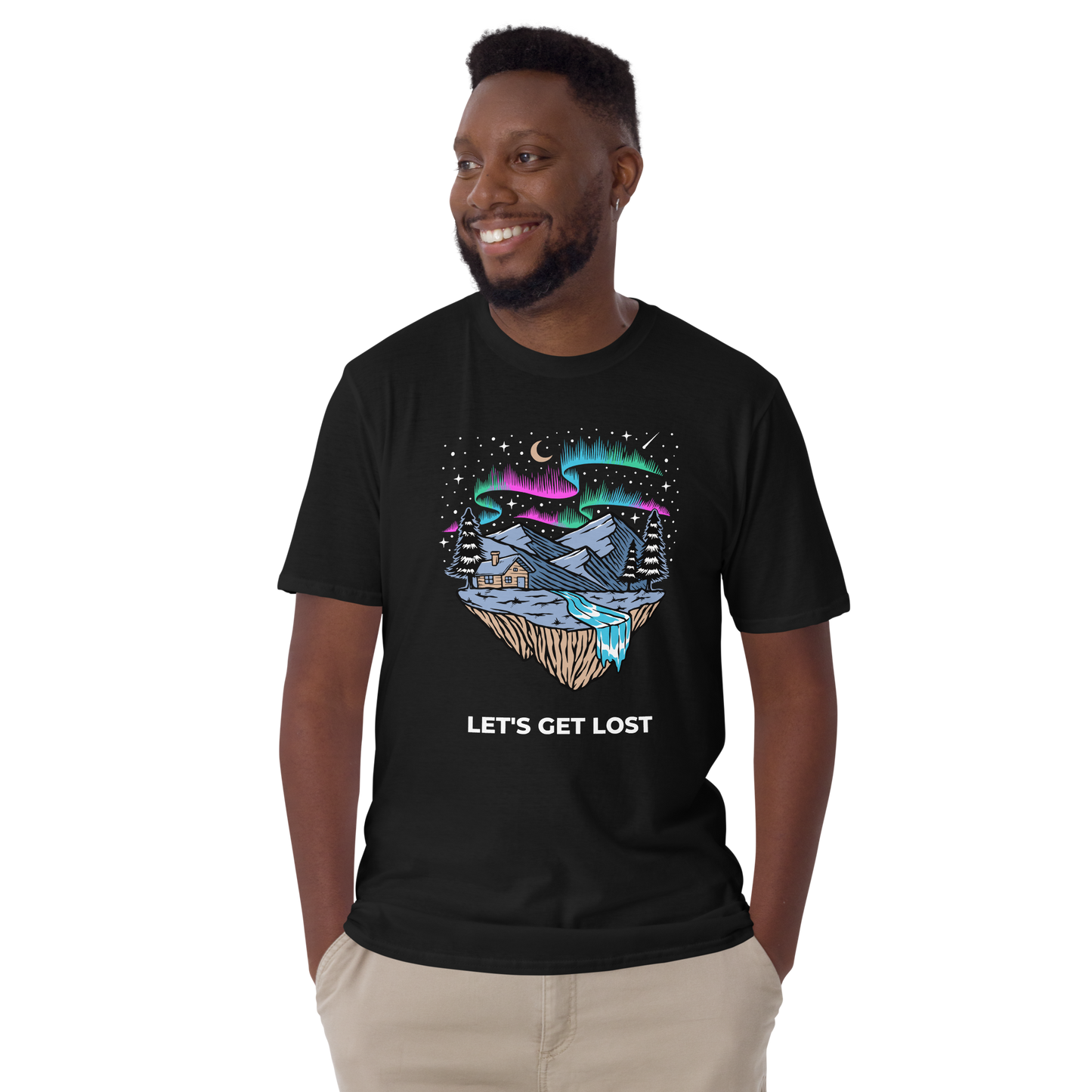 Smiling man wearing a Black Let's Get Lost T-Shirt featuring a mesmerizing night sky, adorned with stars and aurora borealis graphic on the chest - Cool Graphic Northern Lights T-Shirts - Boozy Fox