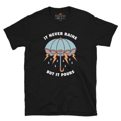Black Umbrella T-Shirt featuring a unique It Never Rains But It Pours graphic on the chest - Cool Tattoo-Inspired Graphic Umbrella T-Shirts - Boozy Fox