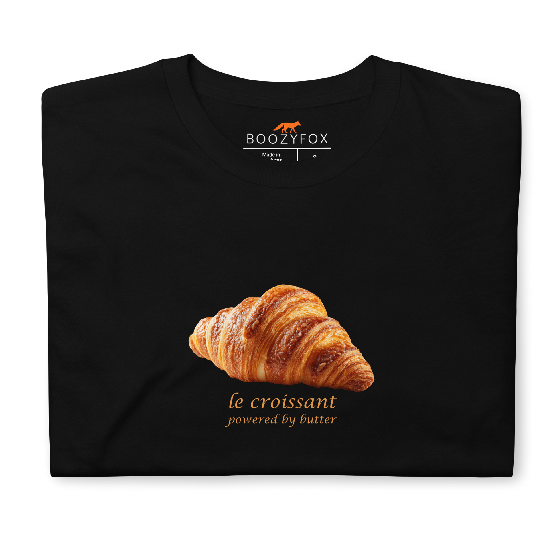 Front details of a Funny Le Croissant graphic t-shirt in black by Boozy Fox