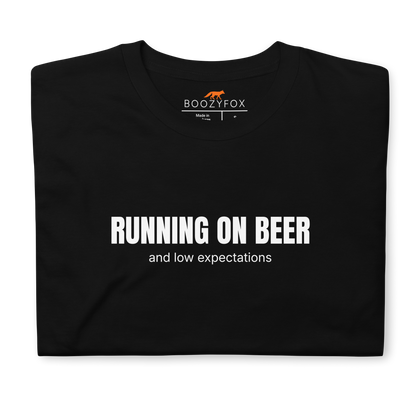 Front details of a Funny Running on Beer graphic t-shirt in black by Boozy Fox