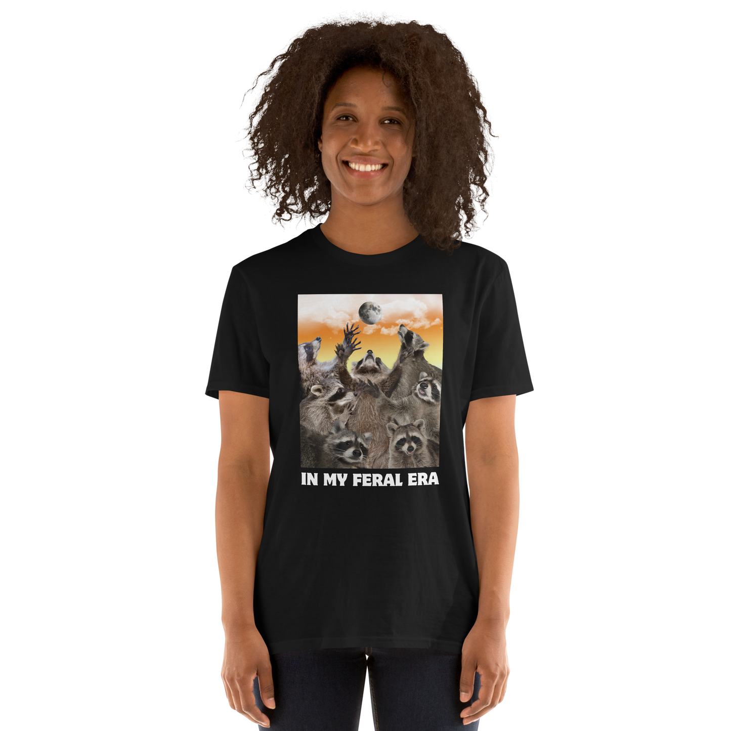 Woman wearing a Funny In My Feral Era Raccoon graphic t-shirt in black by Boozy Fox