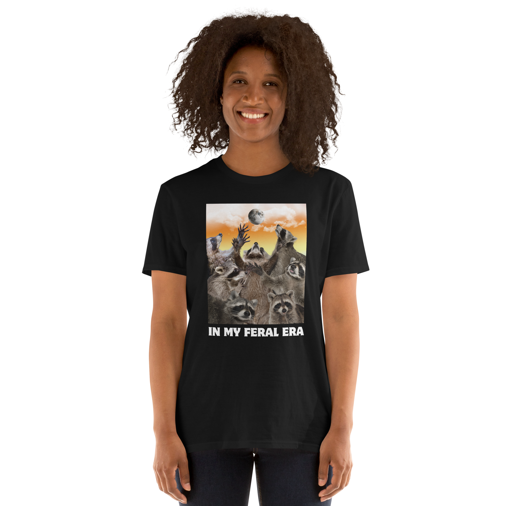 Woman wearing a Funny In My Feral Era Raccoon graphic t-shirt in black by Boozy Fox