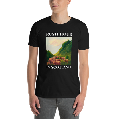 Man wearing a Funny Highland Cow Rush Hour in Scotland graphic t-shirt in black by Boozy Fox
