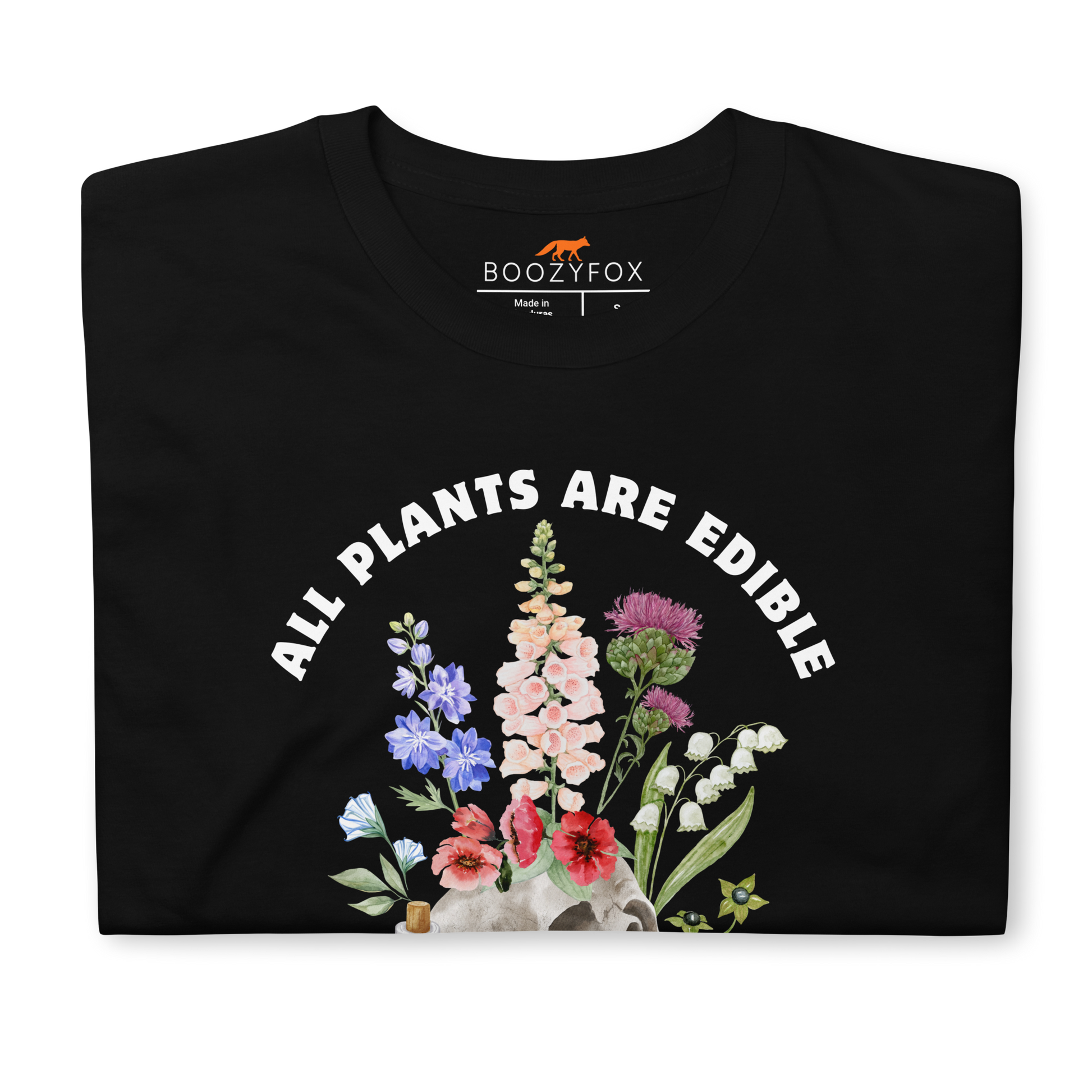 Front details of a Funny All Plants Are Edible Some Only Once Plant graphic t-shirt in black by Boozy Fox