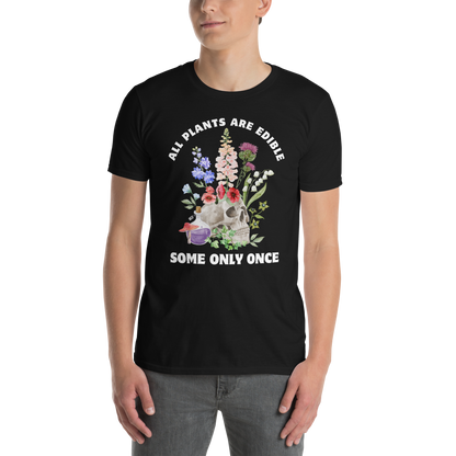 Man wearing a Funny All Plants Are Edible Some Only Once Plant graphic t-shirt in black by Boozy Fox