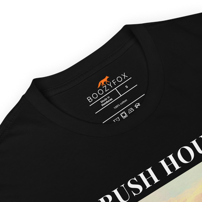 Product details of a Funny Highland Cow Rush Hour in Scotland graphic t-shirt in black by Boozy Fox