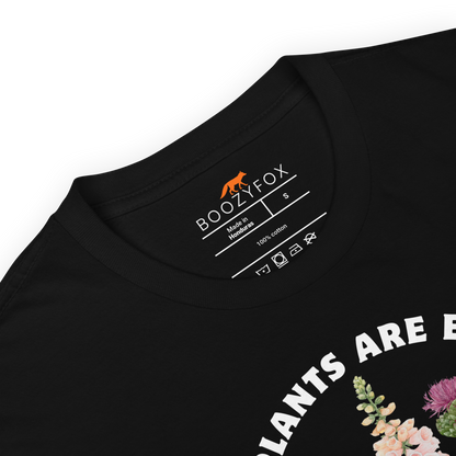 Product details of a Funny All Plants Are Edible Some Only Once Plant graphic t-shirt in black by Boozy Fox