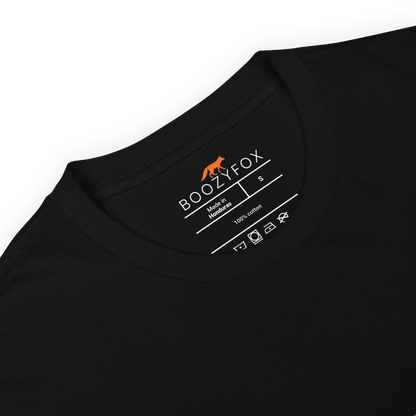 Close-up detail of black t-shirt collar and Boozy Fox neck label