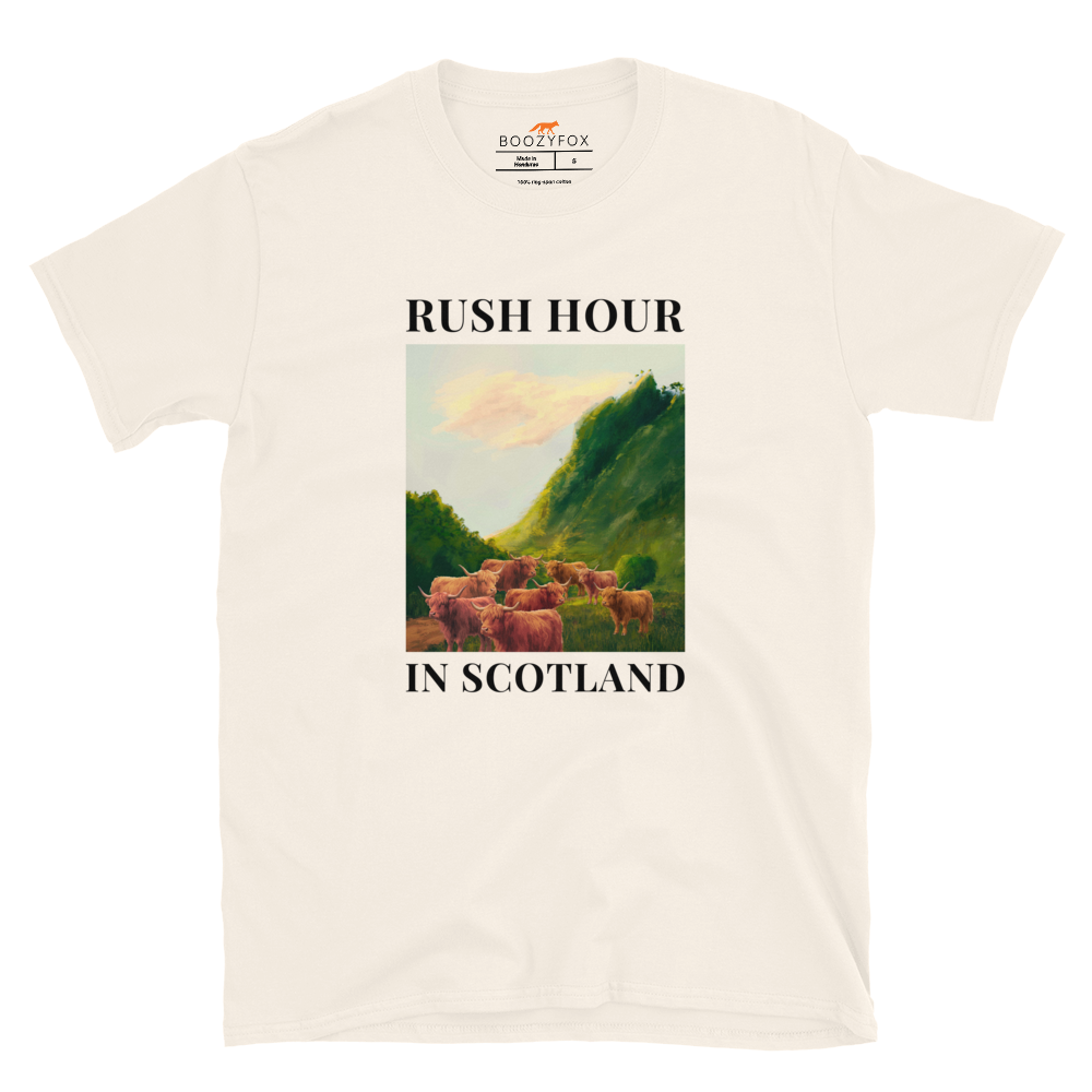 Funny Highland Cow Rush Hour in Scotland graphic t-shirt in natural white by Boozy Fox
