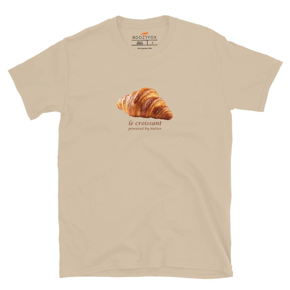 Funny Le Croissant graphic t-shirt in sand by Boozy Fox